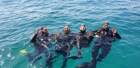 Bautizo Buceo e Inmersión en el mar desde embarcación